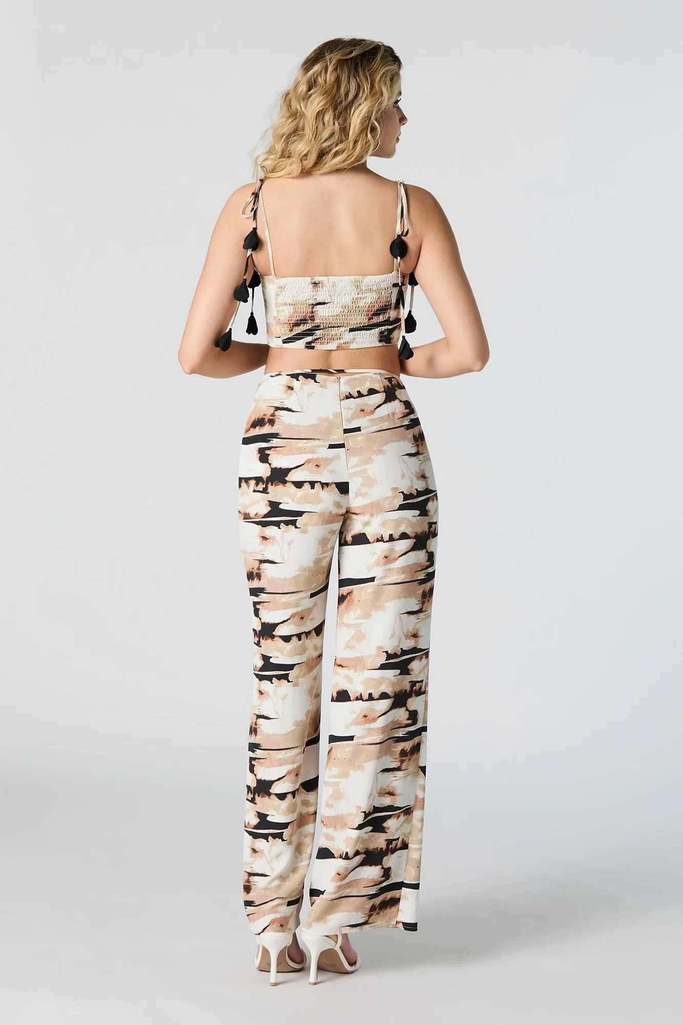 Pantalon palazzo garni d'un rang de pétales